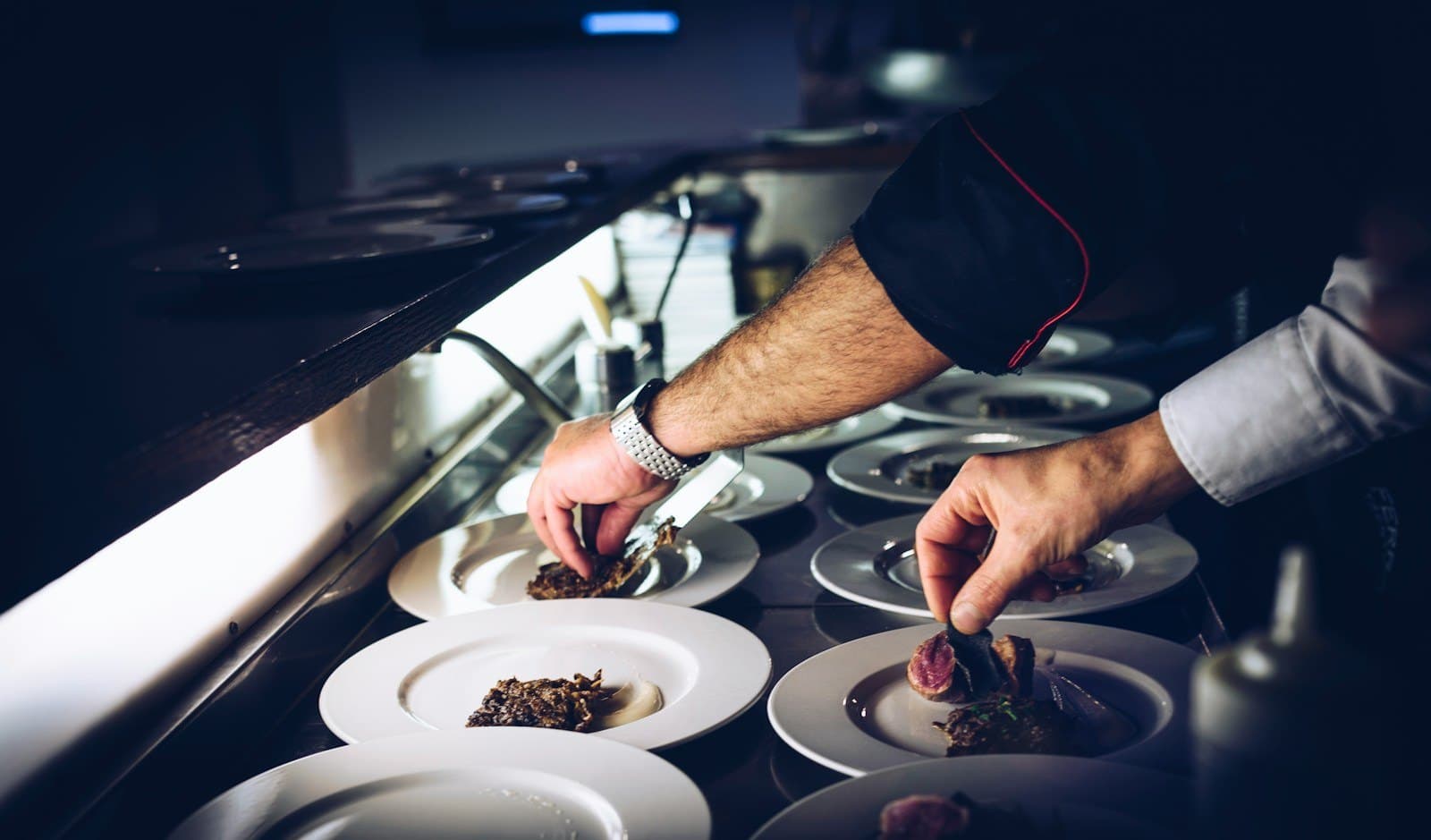 Our chef plating a dish