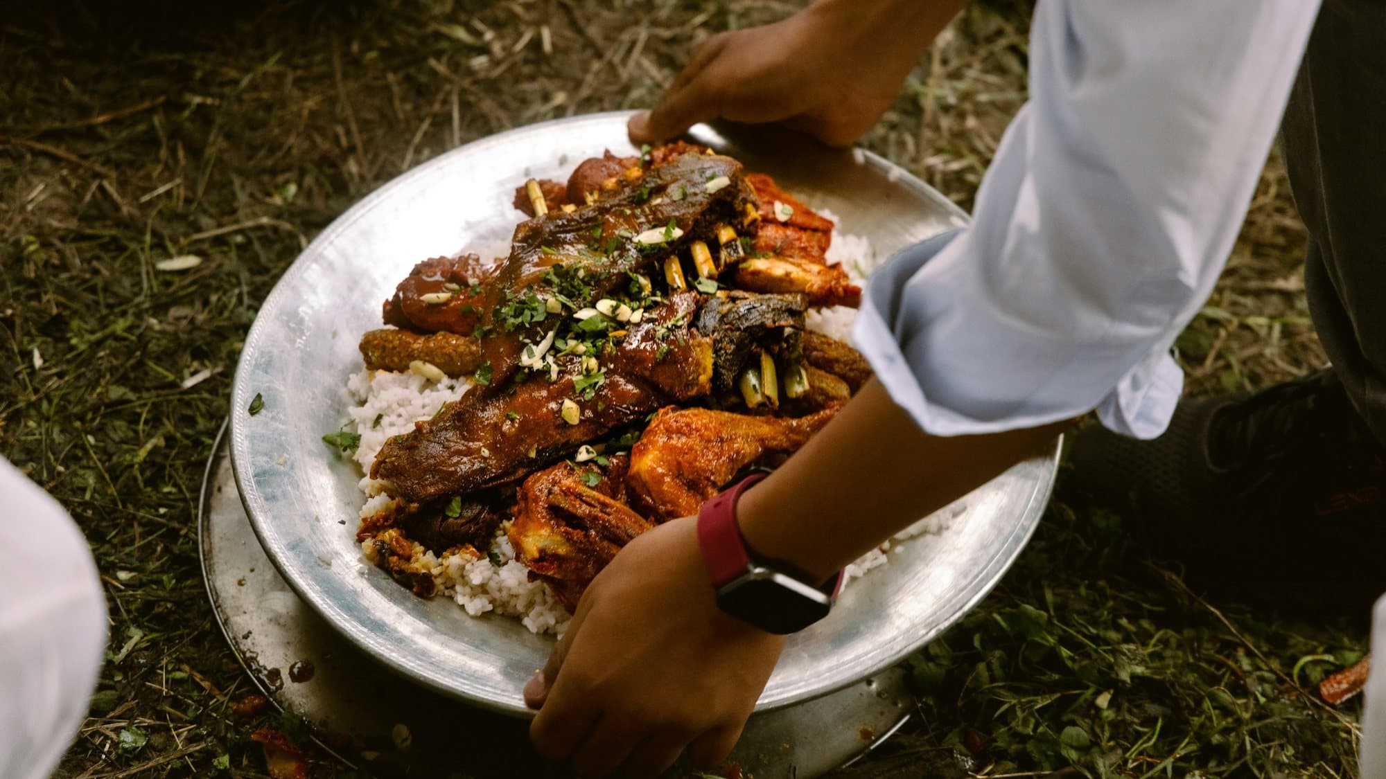 Lamb and rice served to the table